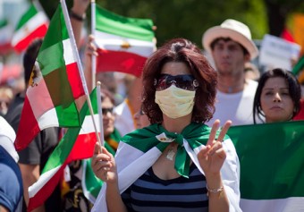 A woman in Toronto protests the results of the Iranian presidential election last summer
