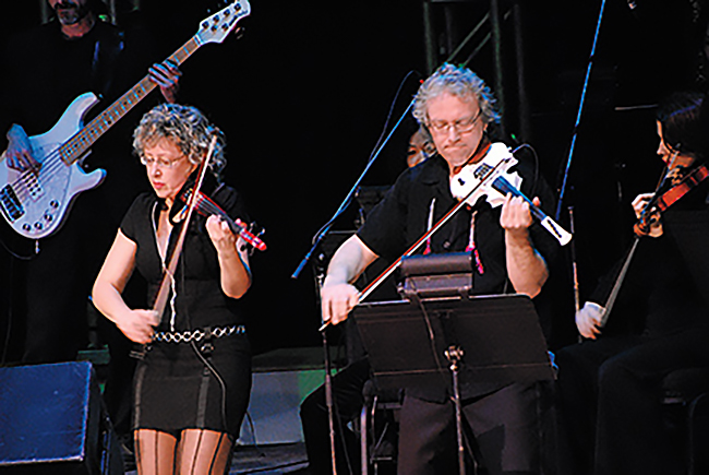 Angela Cox-Daly and Ross Daly performing at Roy Thomson Hall in Toronto, in 2008