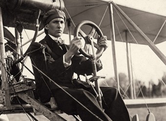 Douglas McCurdy at the wheel of a plane.
