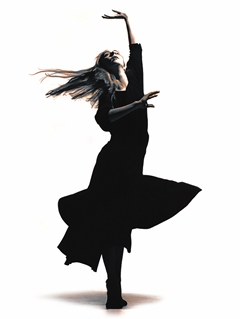 Photo of a Coralee McLaren dancing.
