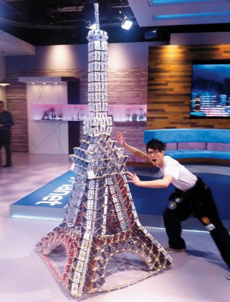 Spark Club’s Hubert Ka with the Eiffel Tower featured on Daily Planet