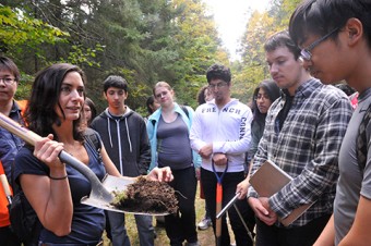 Professor Marney Isaac (PhD 2008) teaches students about nutrient cycles and plant-soil interactions.