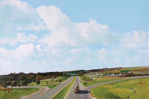 Photo of Canadian rural landscape shows farms on one side and forest, with highway cutting through the two.