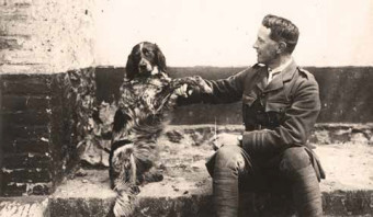 Photo of John McRae and Bonneau the dog.