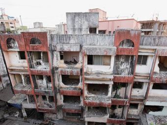 Photo of derelict apartments.
