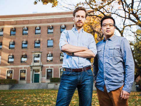 Grad students Scott McAuley (left) and Leo Mui aim to help hospitals control the spread of infections.