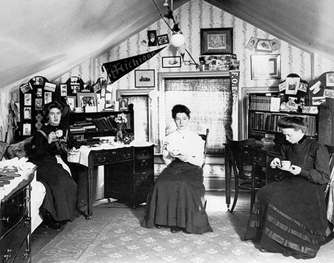 Three students enjoy a cup of tea in their room in Edwardian Toronto.Photo from City of Toronto Archives, Fonds 1244, Item 705A.