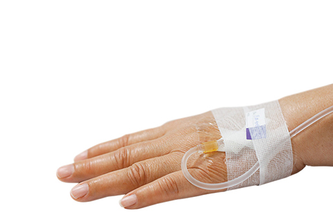 Photo of a hand attach to an IV