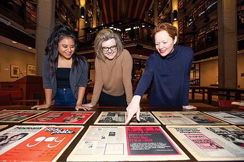 Photo of two students and Prof. Laurie Bertram in the Thomas Fisher Rare Book Library