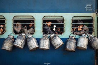 People Winner: “Milk Cartons on Side of Train” by Arjun Yadav