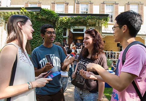 International students in conversation in front of Centre for International Experience