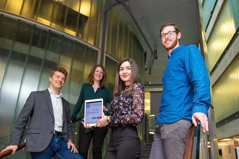 The WinterLight Labs team: Frank Rudzicz, Katie Fraser, Maria Yancheva, who is holding up a tablet, and Liam Kaufman