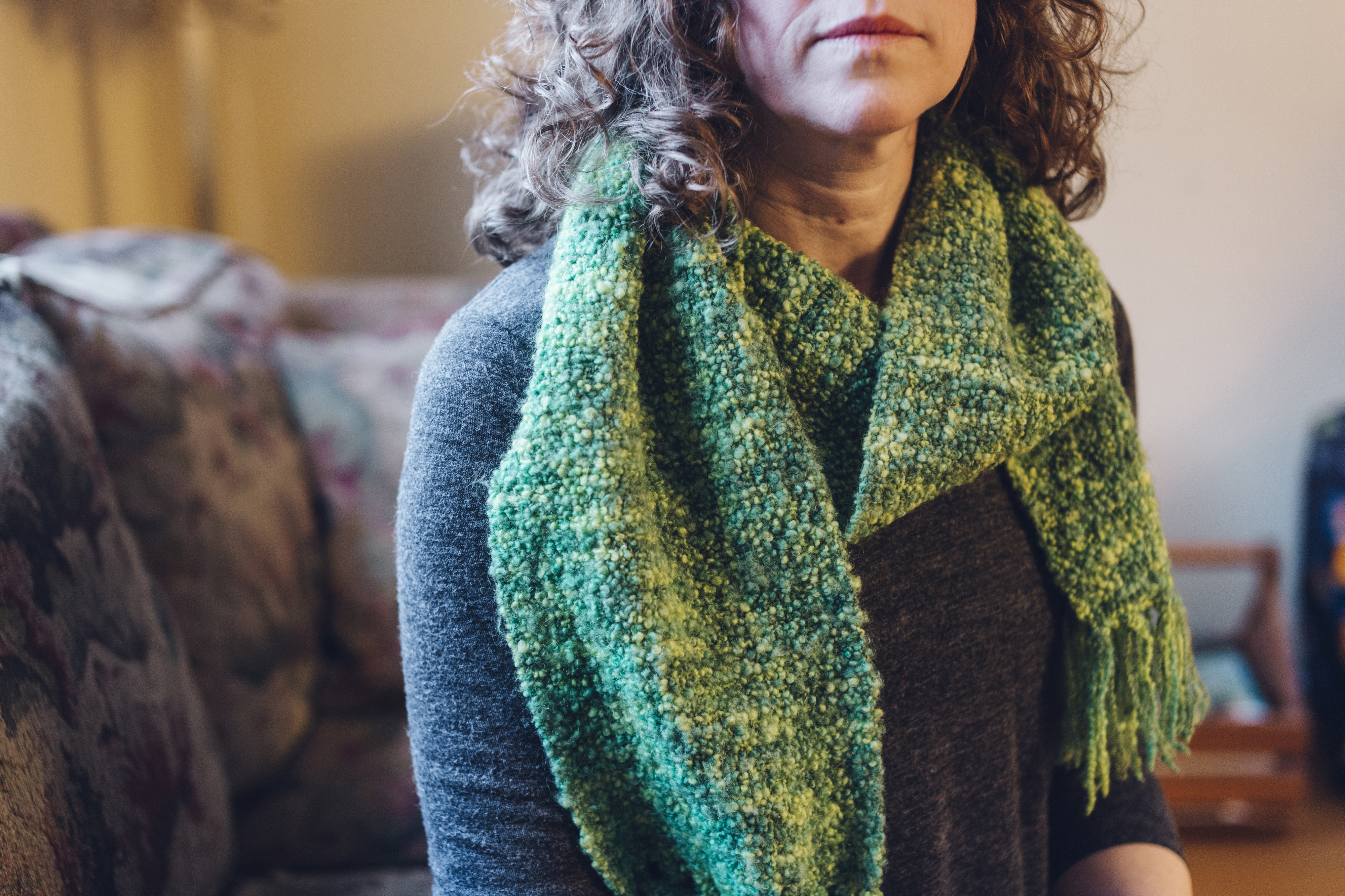 Laura Alary wears the scarf that helped spark her gratefulness.