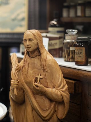 Wood carving of the patron saint of dentistry