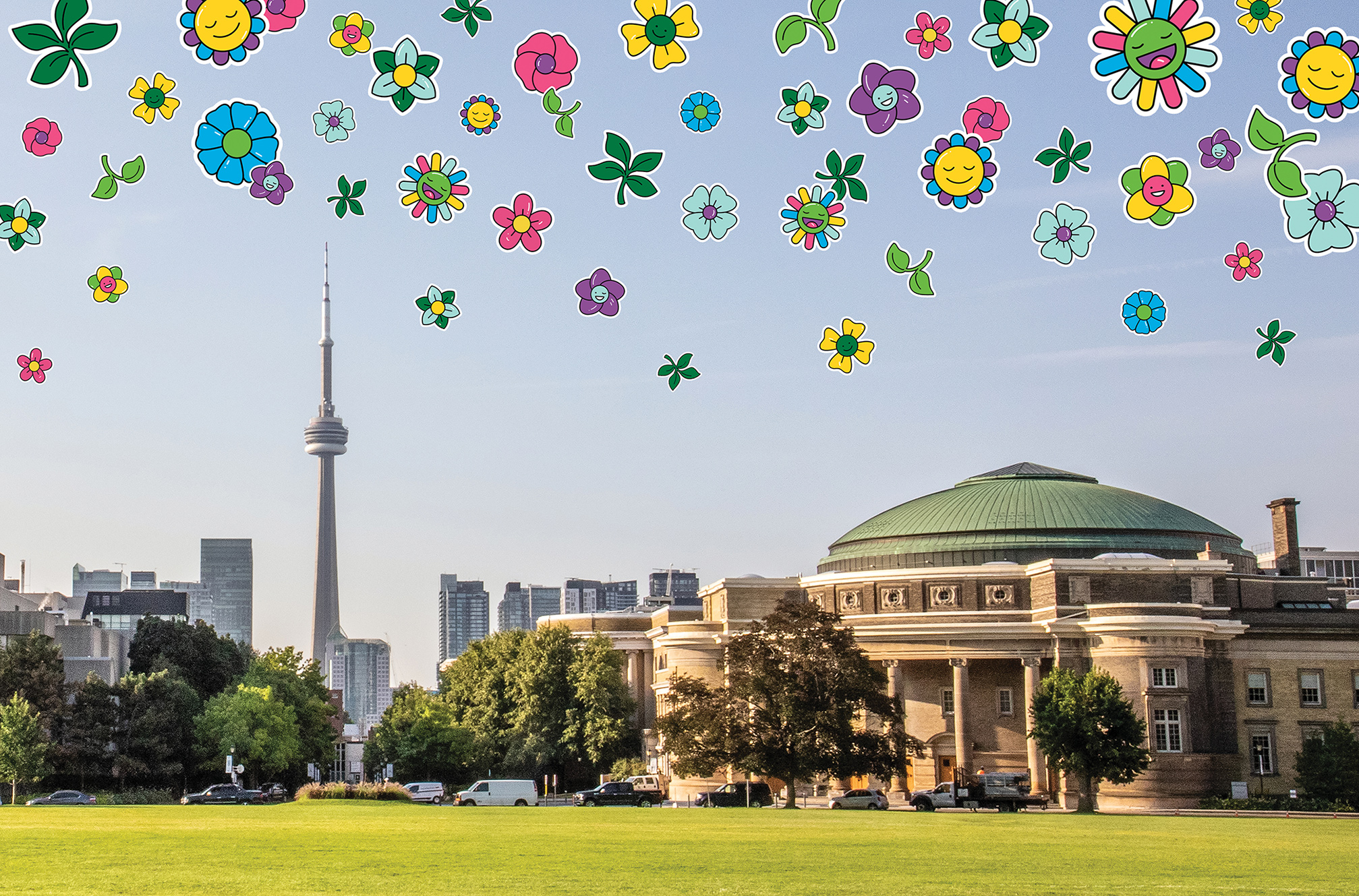 Photo of front campus field and Convocation Hall with flower emoji illustrations floating above