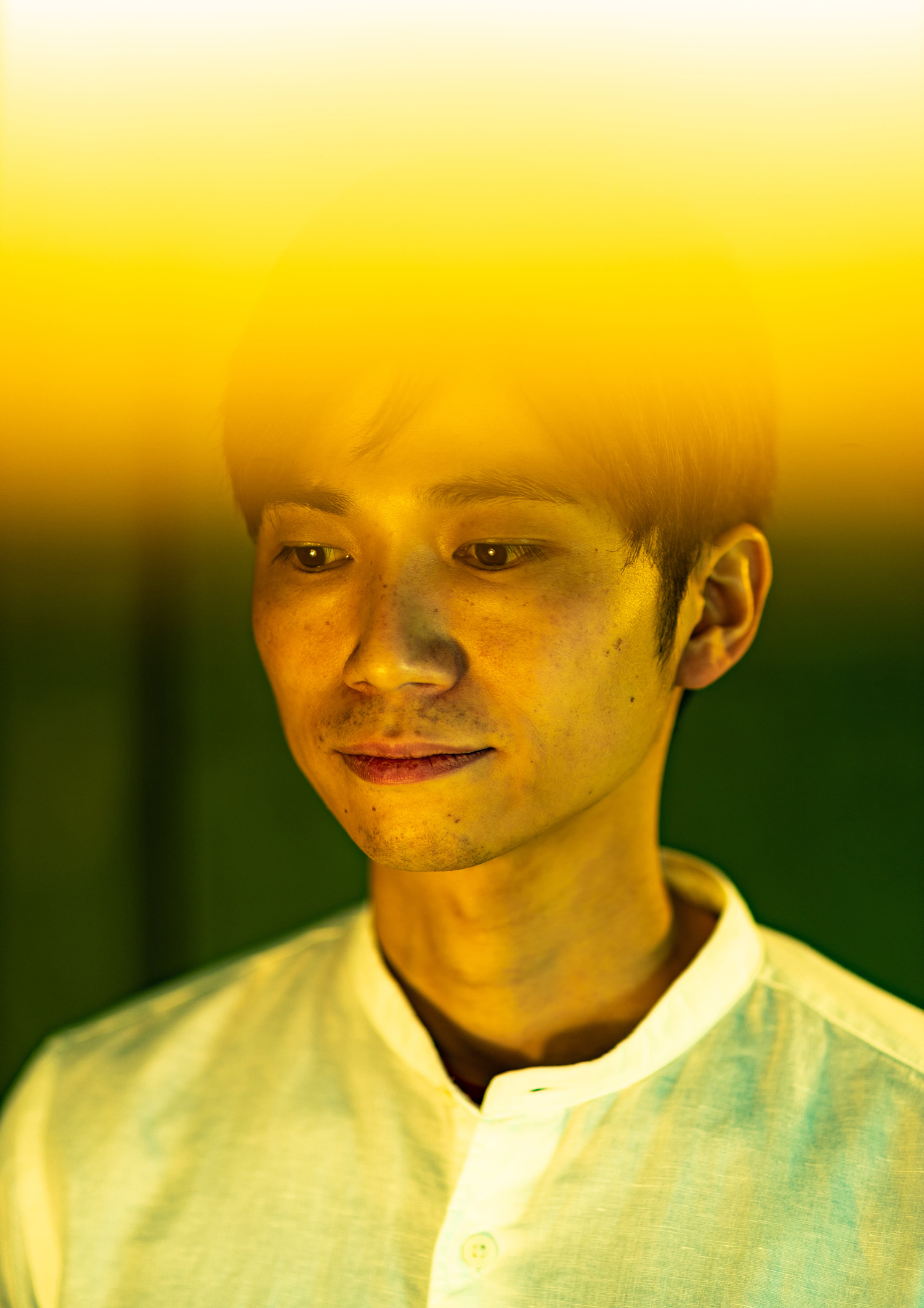 Headshot of Prof. Keisuke Fukuda with a band of orange light covering the top of his head