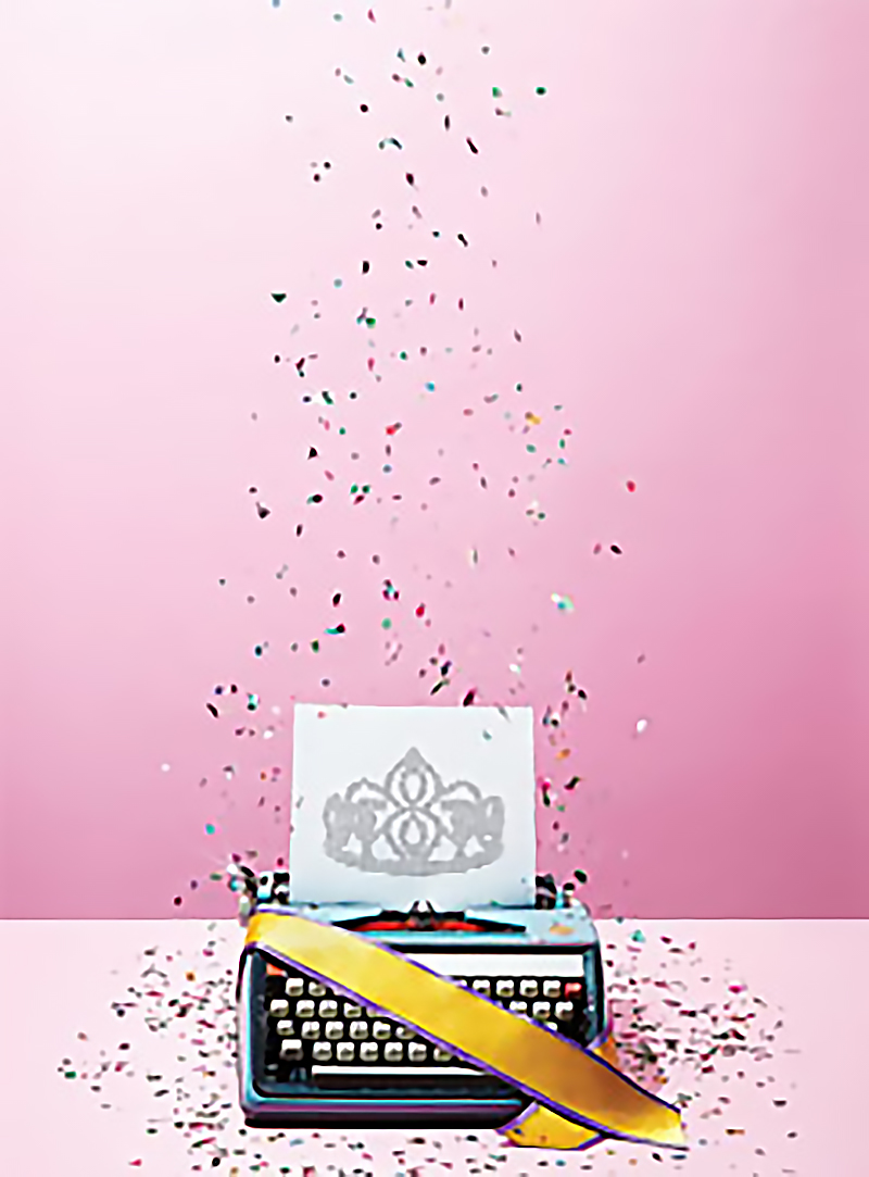 A sheet of paper with an illustration of a crown, inserted into a typewriter adorned with a yellow ribbon, colourful confetti falling from above