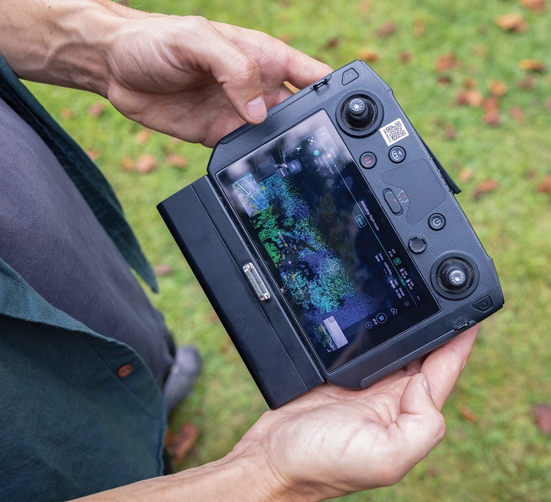 Close up shot of a coloured map on the monitor of an aerial drone controller